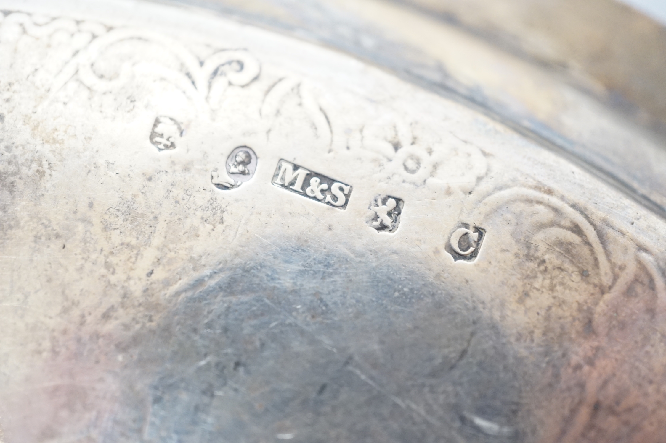 A George IV Scottish engraved silver circular salver, Mitchell & Sons, Glasgow, 1821, (centre gauge very thin), 24.9cm, 17.8oz.